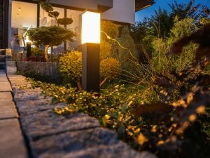 How can you transform pools and outdoor spaces with lighting?